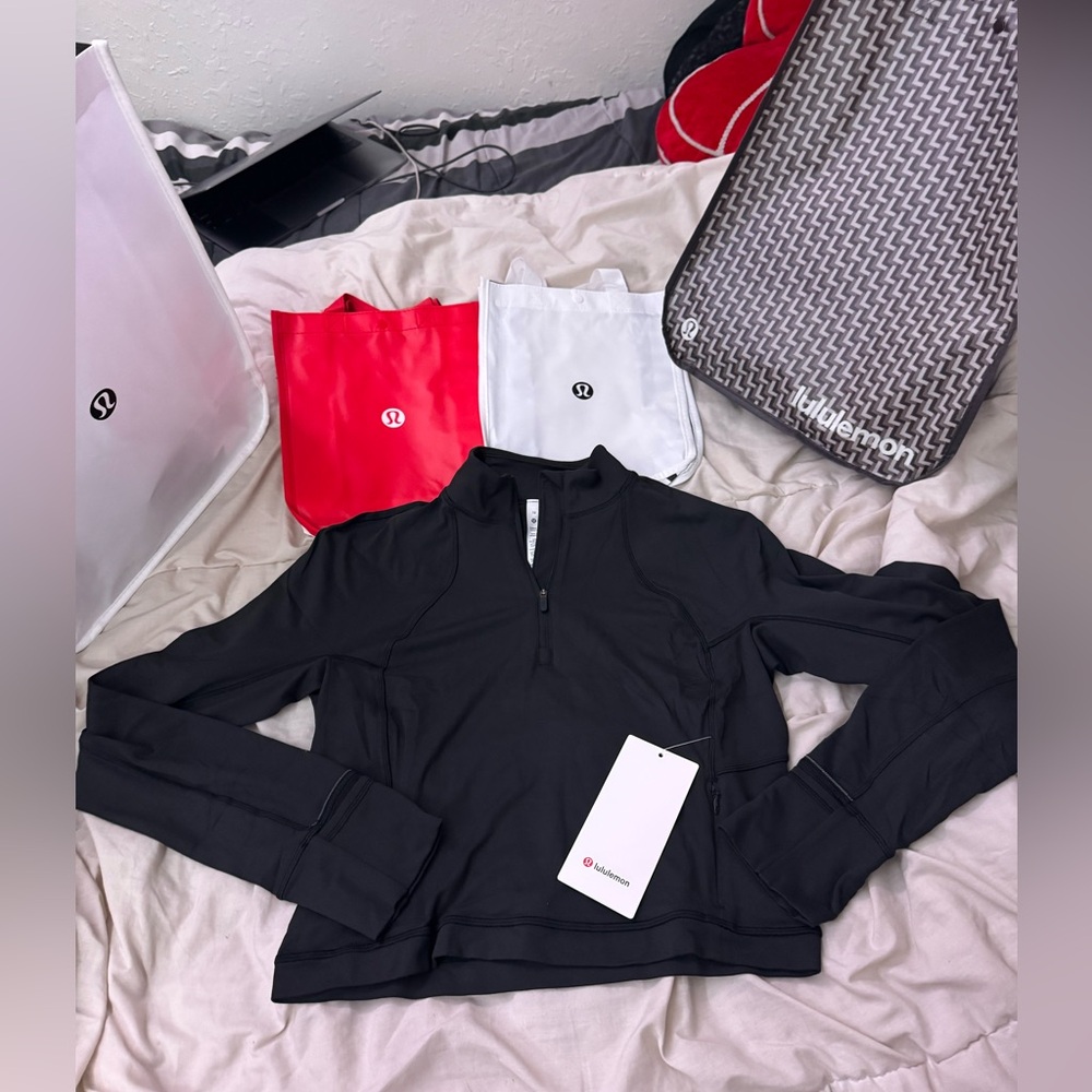 Lululemon it’s rulu run cropped half zip NWT! Size 10